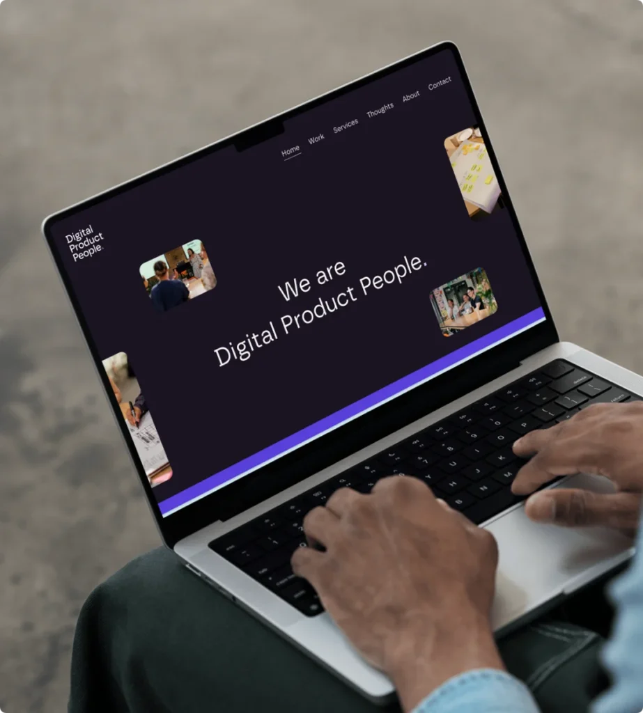A laptop showing the homepage of Digital Product People