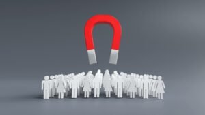 Lead magnet ideas shown as magnet attracting people