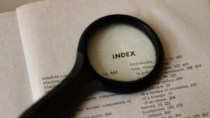 Magnified Index in a book, a metaphor for Google’s semantic indexing.