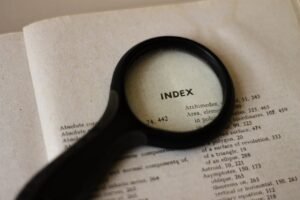 Magnified Index in a book, a metaphor for Google’s semantic indexing.